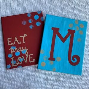 2 painted canvases - “M” & “eat, pray, love”